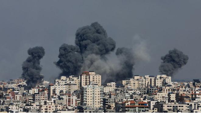 Smoke rises following Israeli strikes in Gaza, October 7, 2023