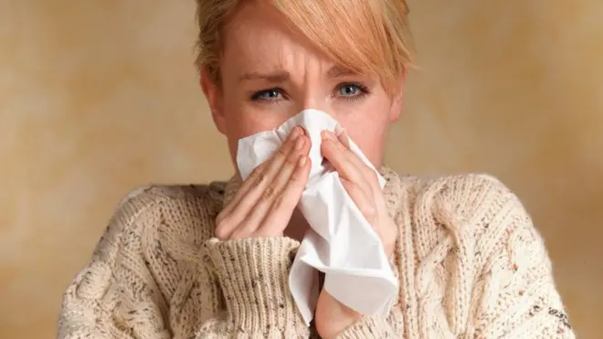 File picture of someone with a cold