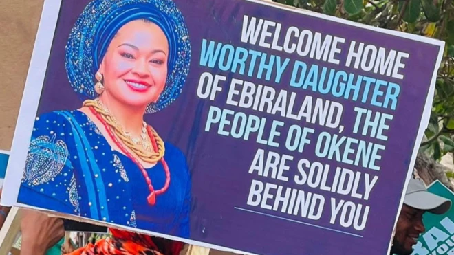 Image of Senator Natasha Akpoti-Uduaghan ontop placard