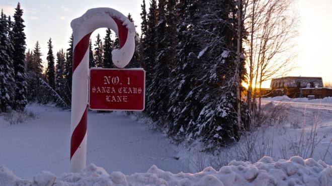A Candy Cane sign saying Santa Claus Lane