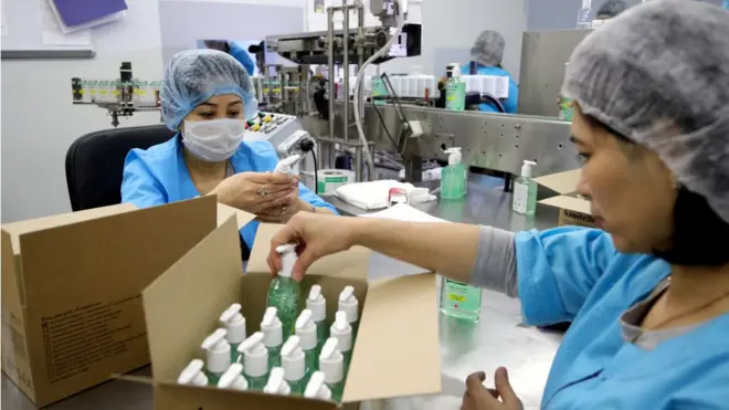 MOSCOW, RUSSIA - MARCH 23, 2020: Employees packaging bottles of Sanitelle hand sanitizer at a Bentus Laboratories plant.