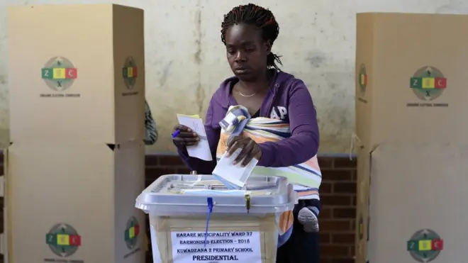 A Zimbabwean woman casts her ballot in the country"s general elections in Harare, Zimbabwe, July 30, 2018