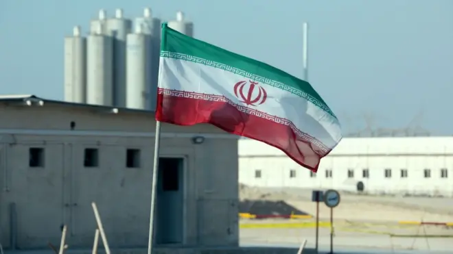A picture taken on November 10, 2019, shows an Iranian flag in Iran's Bushehr nuclear power plant