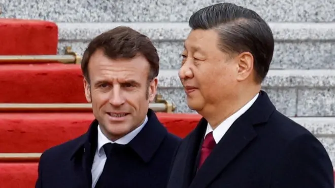 Chinese President Xi Jinping welcomes French President Emmanuel Macron at the Great Hall of the People, in Beijing, China, April 6, 2023.