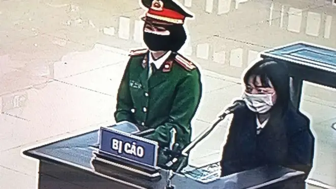Bà Phạm Đoan Trang tại phiên tòa 14/12/2021 (ảnh chụp qua màn hình)