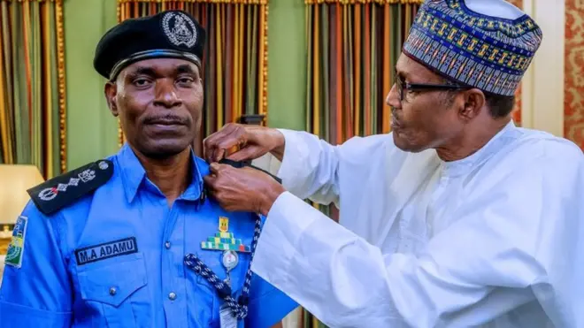 Mohammed Adamu wit Muhammadu Buhari