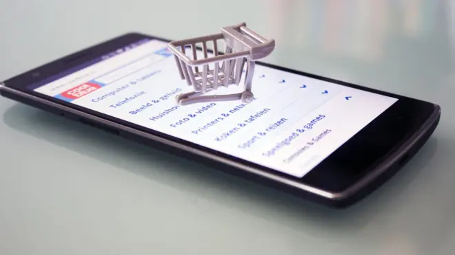 Phone with shopping basket on top am.