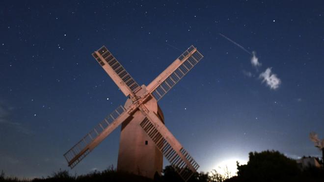 A meteor captured above the Jill Windmill in West Sussex early on Sunday