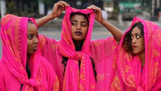 On Sunday these women dressed in traditional clothes of the Harari culture of eastern Ethiopia step out in style for the inauguration ceremony of the remodeled Meskel Square in Addis Ababa...