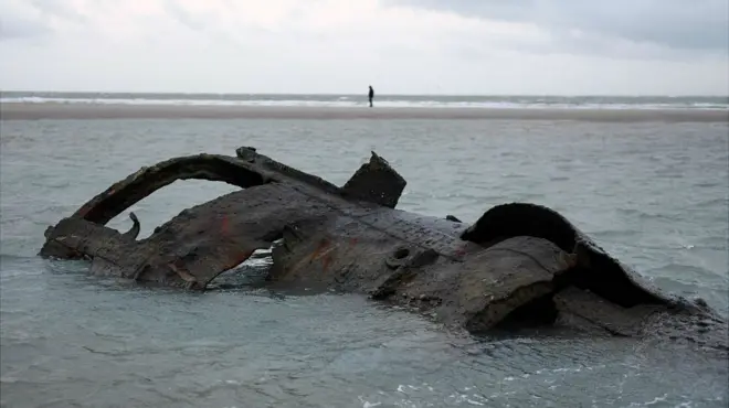 Wreckage of a German submarine which ran aground off the coast of Wissant in July 1917 and has resurfaced due to to sand movements