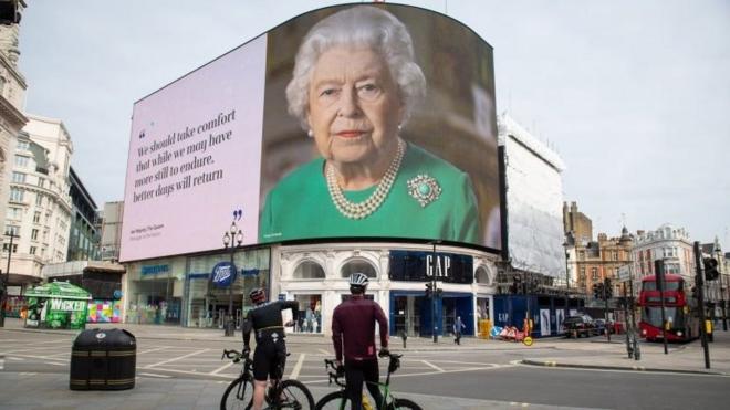 photo dated 8/4/2020 of an image of Queen Elizabeth II and quotes from her broadcast on Sunday to the UK and the Commonwealth in relation to the coronavirus epidemic are displayed on lights in London"s Piccadilly Circus. The Queen celebrates her 94th birthday