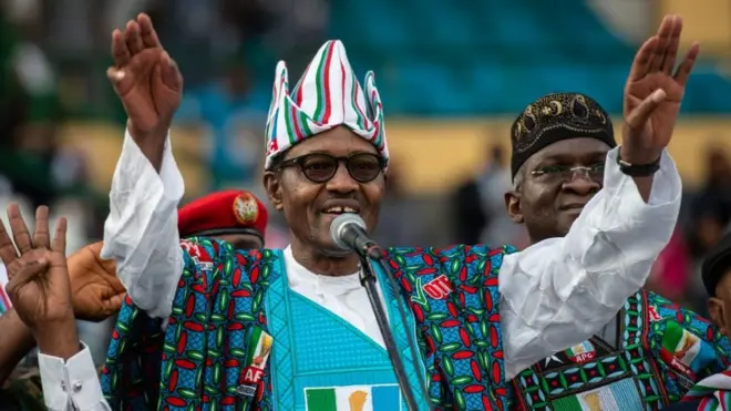 Oga Buhari wey cut tape for di cancer treatment centre afta im finish for di APC presidential rally for Teslim Balogun Stadium, Surulere