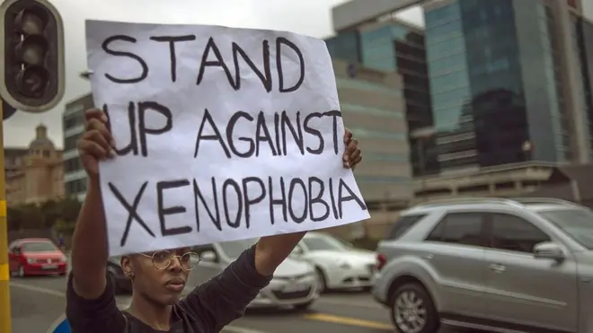 Protester with placard