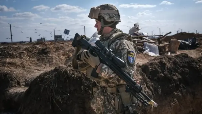 A Ukrainian soldier in trench as he take his position in the southern Ukrainian city of Mykolaiv, Ukraine, 25 March 2022