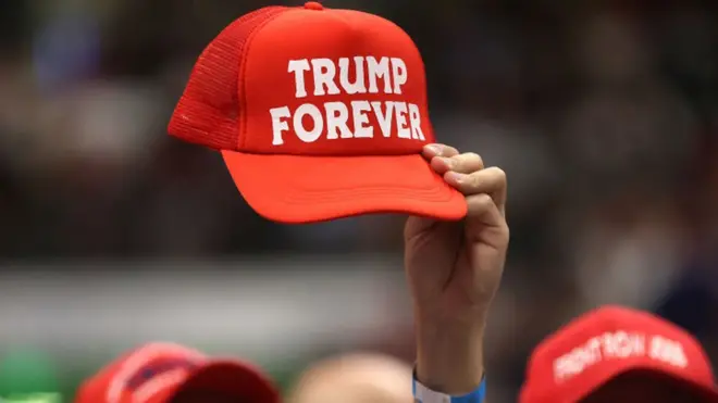 Трамп не участвует в этих выборах, но его личность и политика едва ли не главный предмет спора