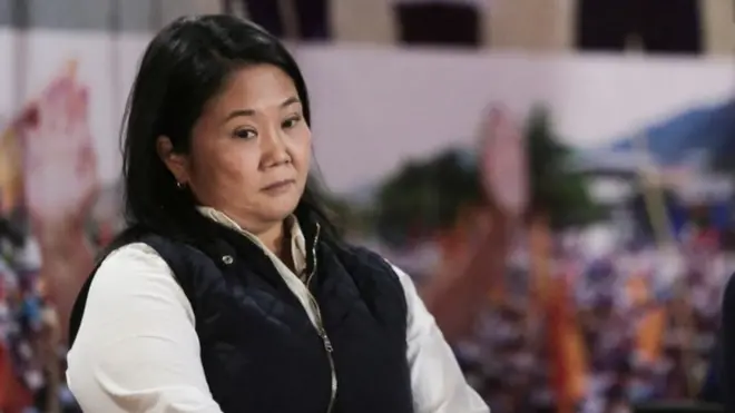 Peru's presidential candidate Keiko Fujimori reacts at a news conference the day after a run-off election, in Lima, Peru June 7, 2021.
