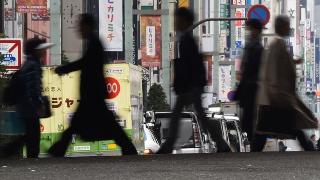 People crossing a street in Tokyo