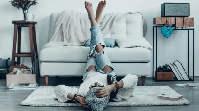 Stock picture of young person at home