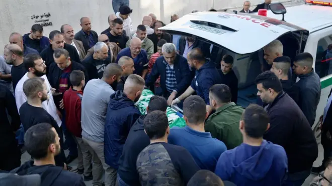 Basel Abu al-Wafa's body was wrapped in a Hamas flag - something a relative said he would not have wanted