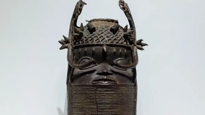 A 'Memorial Head' (Unhunmwun elau, from Nigeria, Benin Kingdom, collected in Nigeria and acquired 1898) is displayed as part of an exhibition on the 'Benin Bronzes' during a press preview of new exhibition halls ahead of their opening in the east wing of the new Berlin Palace Humboldt Forum in Berlin on September 15, 2022