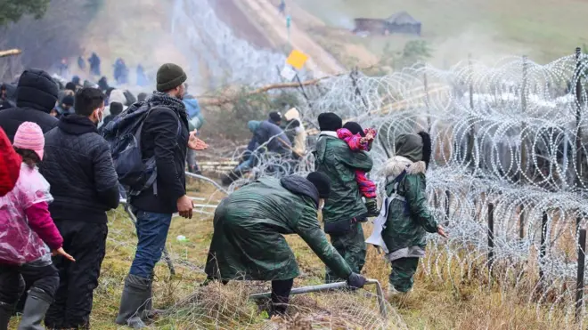 Migrants are seen on the Belarusian-Polish border