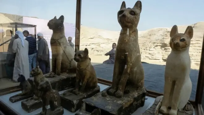 Cat statues that were found inside a cache at the Saqqara area near its necropolis, south of Cairo
