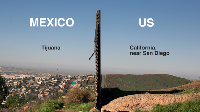 Imagem da barreira que existe atualmente na fronteira entre os EUA e o México