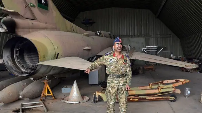 GNA officer Capt Qanunu posed next to a MiG-23 at captured al-Watiya airbase