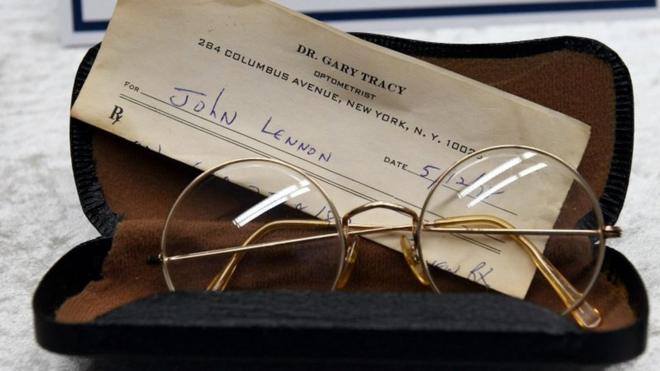 Glasses from the estate of John Lennon are pictured during a press conference on November 21, 2017 in Berlin.