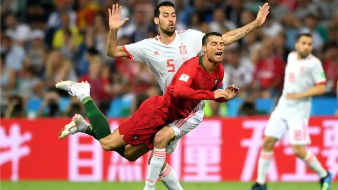 Ronald dey action wen Spain lock horn wit Portugal