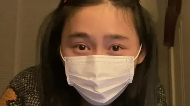 Wuhan resident in mask