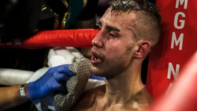Maxim Dadashev dey receive attention for im corner afta dem throw in di towel for di di 11th round of im junior welterweight IBF World Title Elimination fight against Maxim Dadashev