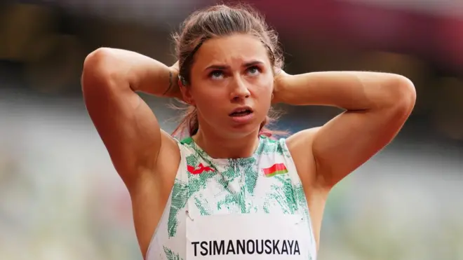Krystina Timanovskaya of Belarus reacts after competing at the Olympics
