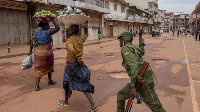 Ugandan police were seen hitting vendors who refused to clear the streets