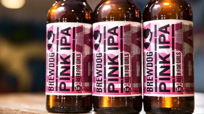 Three bottles of Pink IPA beer