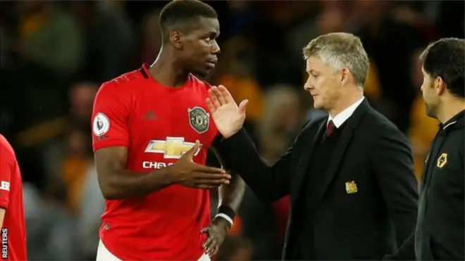 Le manager de Manchester United, Ole Gunnar Solskjaer et Paul Pogba.