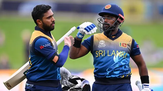 Charith Asalanka and Kusal Mendis of Sri Lanka leave the field after their victory during the ICC Men's T20 World Cup match between Sri Lanka and Ireland at Bellerive Oval on October 23,
