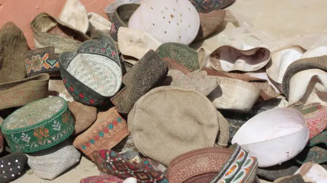 These caps are said to have belonged to victims of the Dasht-e-Archi attack