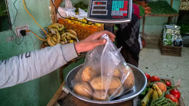 بائع خضراوات