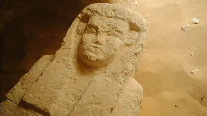 A sarcophagus from one of the three tombs discovered at burial grounds south of Cairo