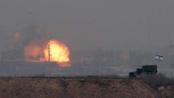 An Israeli jeep close to the Gaza boundary on Tuesday during an air strike