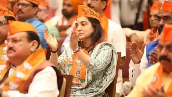 Axaddii, xisbiga BJP ayaa shaqada ka joojiyay Sharma.