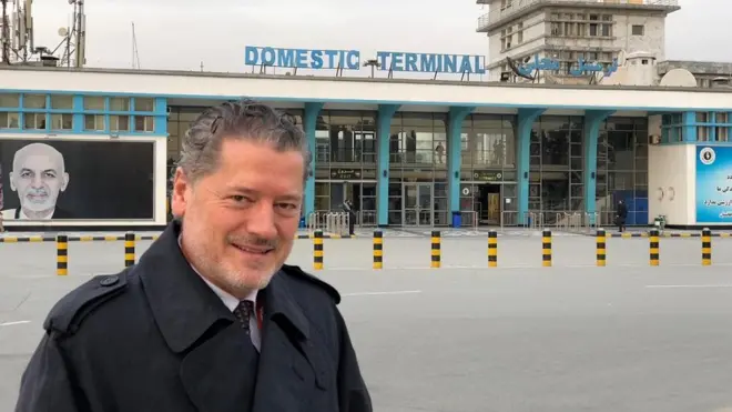 Pilots Vasileios Vasileiou pictured outside the domestic terminal at Hamid Karzai International Airport
