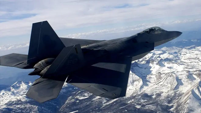 F-22 jet flying over the Sierra Nevada mountains in an archive photo