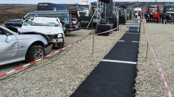 The one-metre stunt resonated among Romanians fed up with the state of their roads