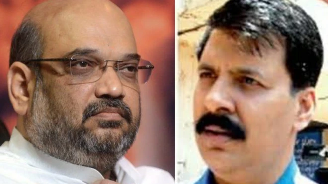 અમિત શાહ તથા રજનીશ રાયની તસવીર