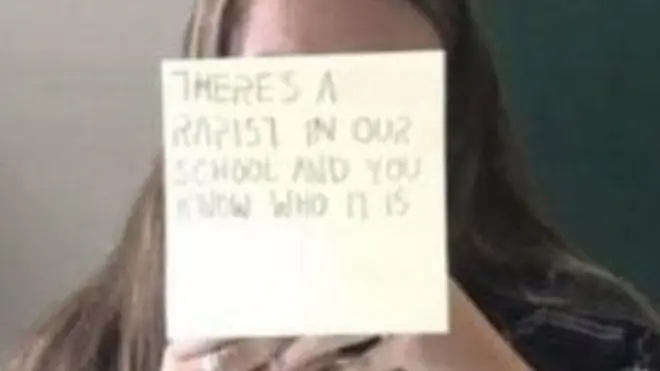 Aela Mansmann shows the note she posted, leading to her punishment