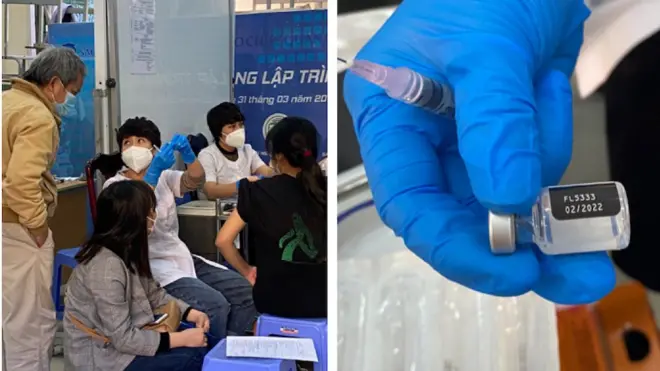 Nhân viên y tế cho phụ huynh học sinh xem số lô và hạn sử dụng vaccine.