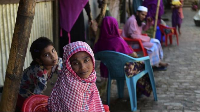 In this photograph taken on 26 November 2016, Myanmar Rohingya refugees look on in a refugee camp in Teknaf, in Bangladesh's Cox's Bazar.