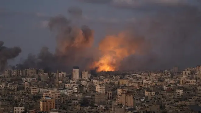 Smoke rises following an Israeli air strike in northern Gaza City